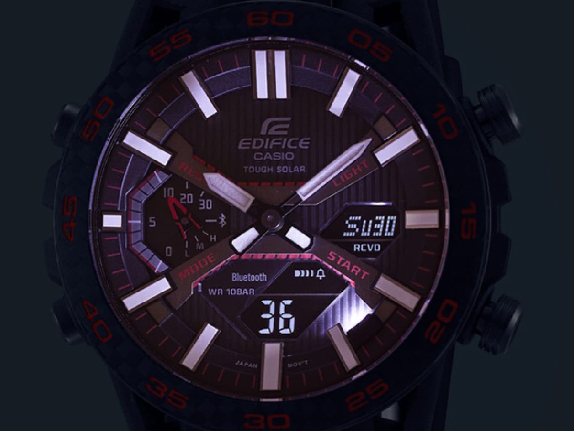 Edifice ECB2000 in a dark environment, with a watch face lit by the watch LED light